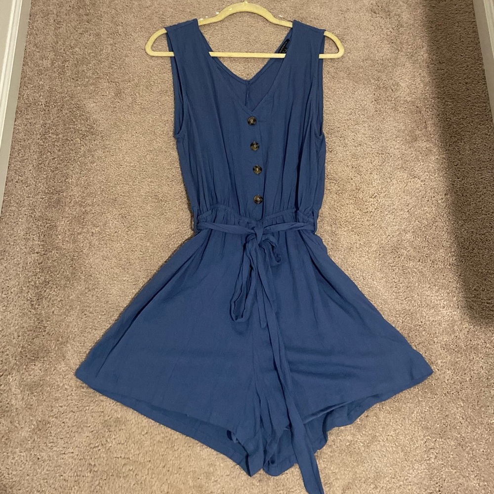 Blue romper with button detail